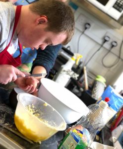 James and Henry baking in the cafe