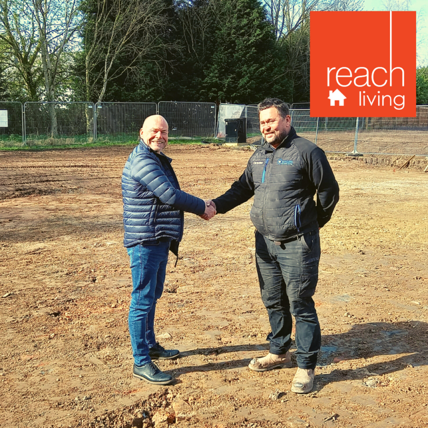 Steve Shatwell shaking hands with contractor from Ratcliffe Builders