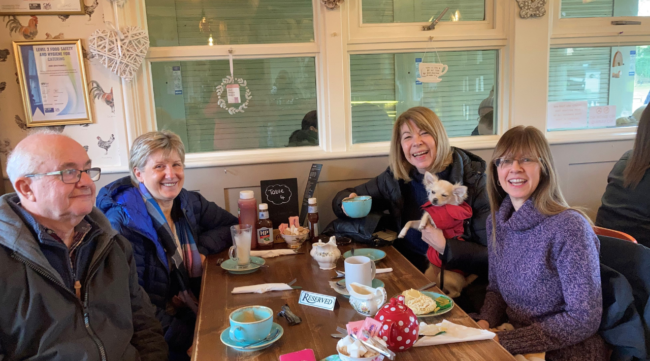 photo of carers enjoying coffee and cake together in Mansfield