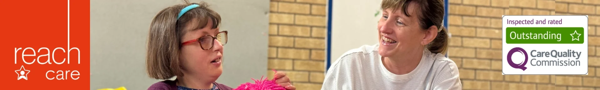 2 ladies looking at each other smiling